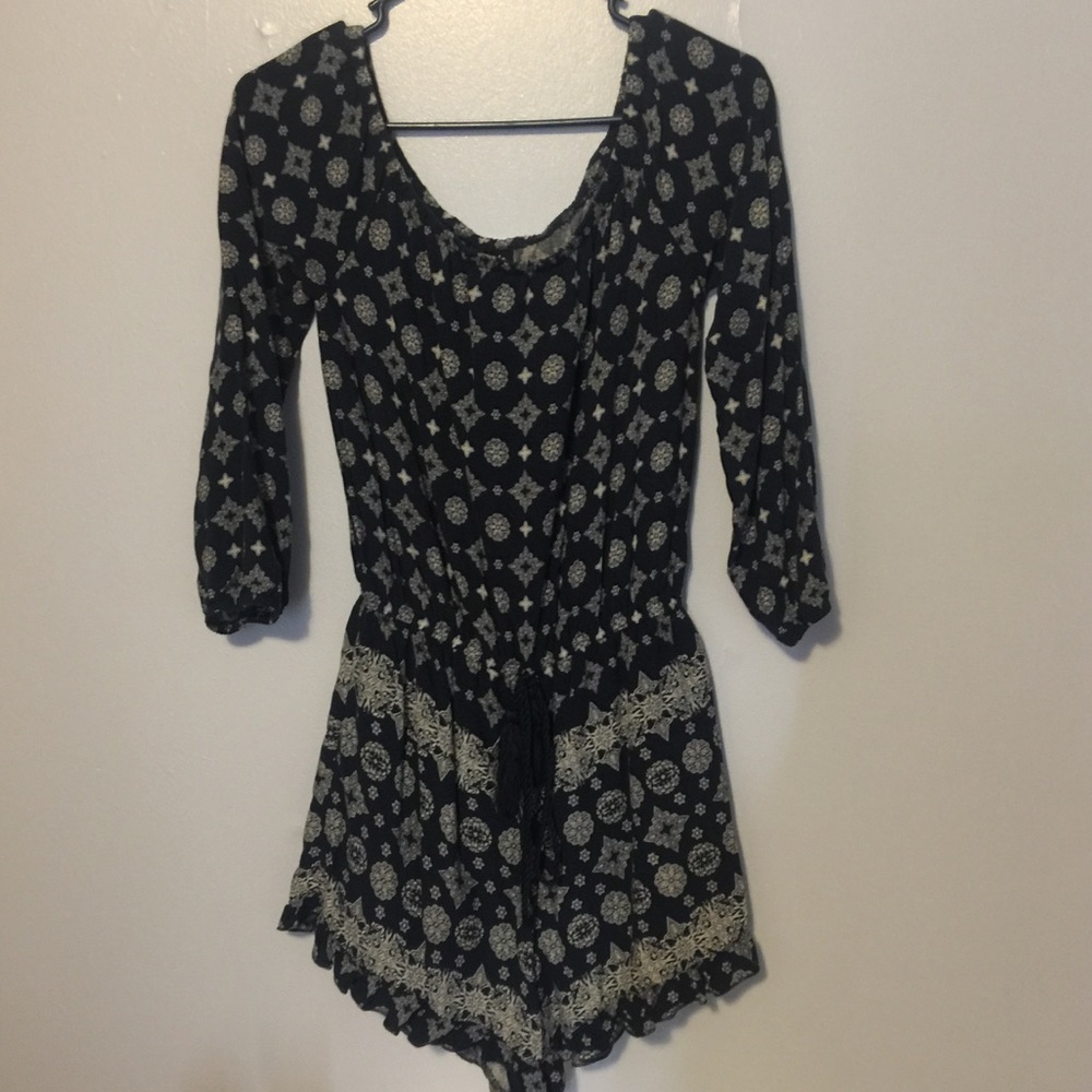Navy and white off the shoulder romper.